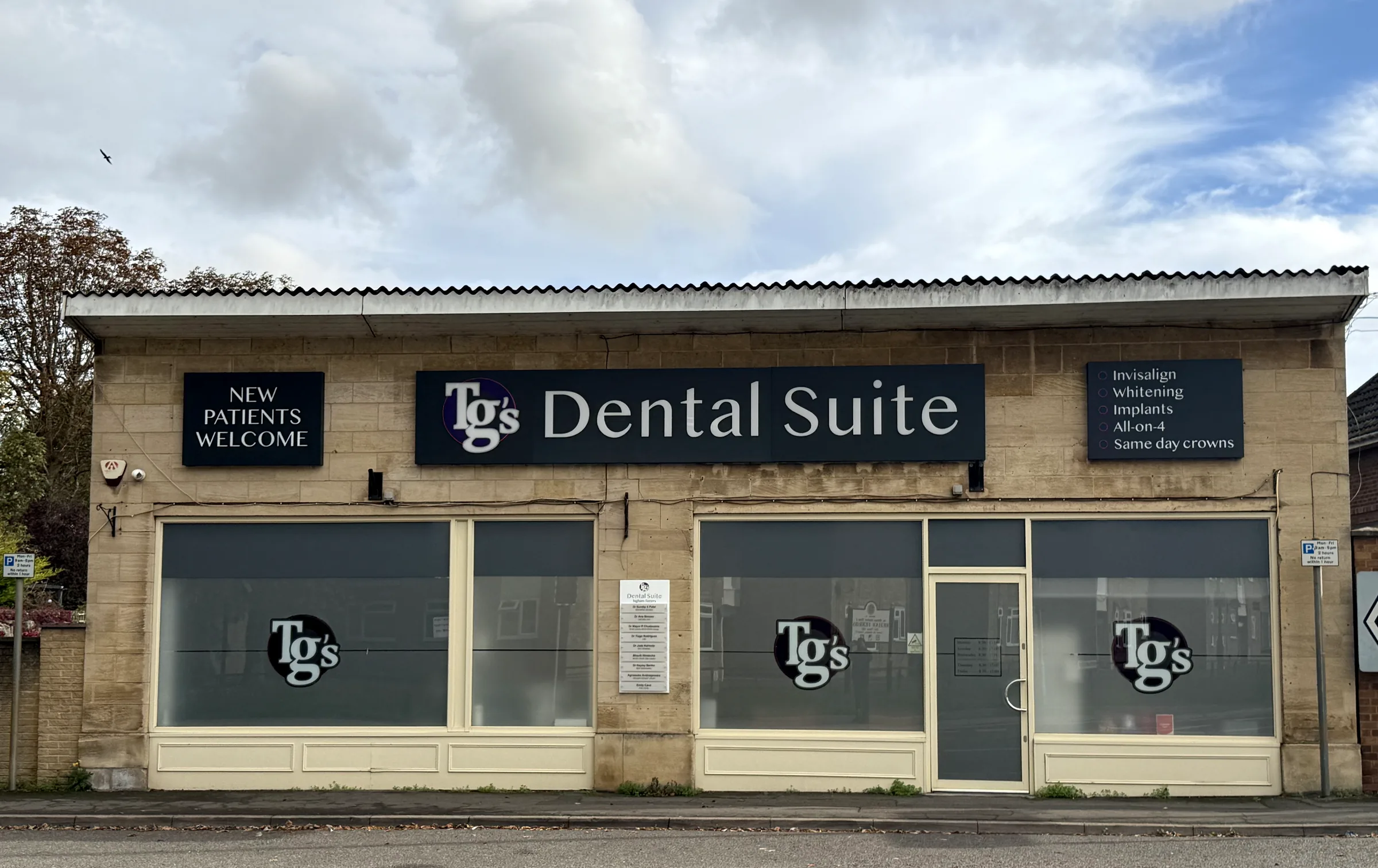 TG's Dental Suite Higham Ferrers from across the road, with the full fascia and window graphics